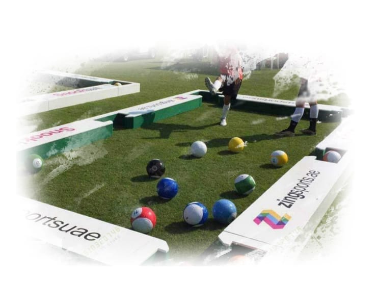 Oyuncuların futbol toplarını bilardo kurallarına göre ıstaka yerine ayakları ile deliklere sokmaya çalıştığı bir oyundur.